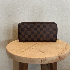 Louis Vuitton Brown Checkered Wallet with Gold Accent